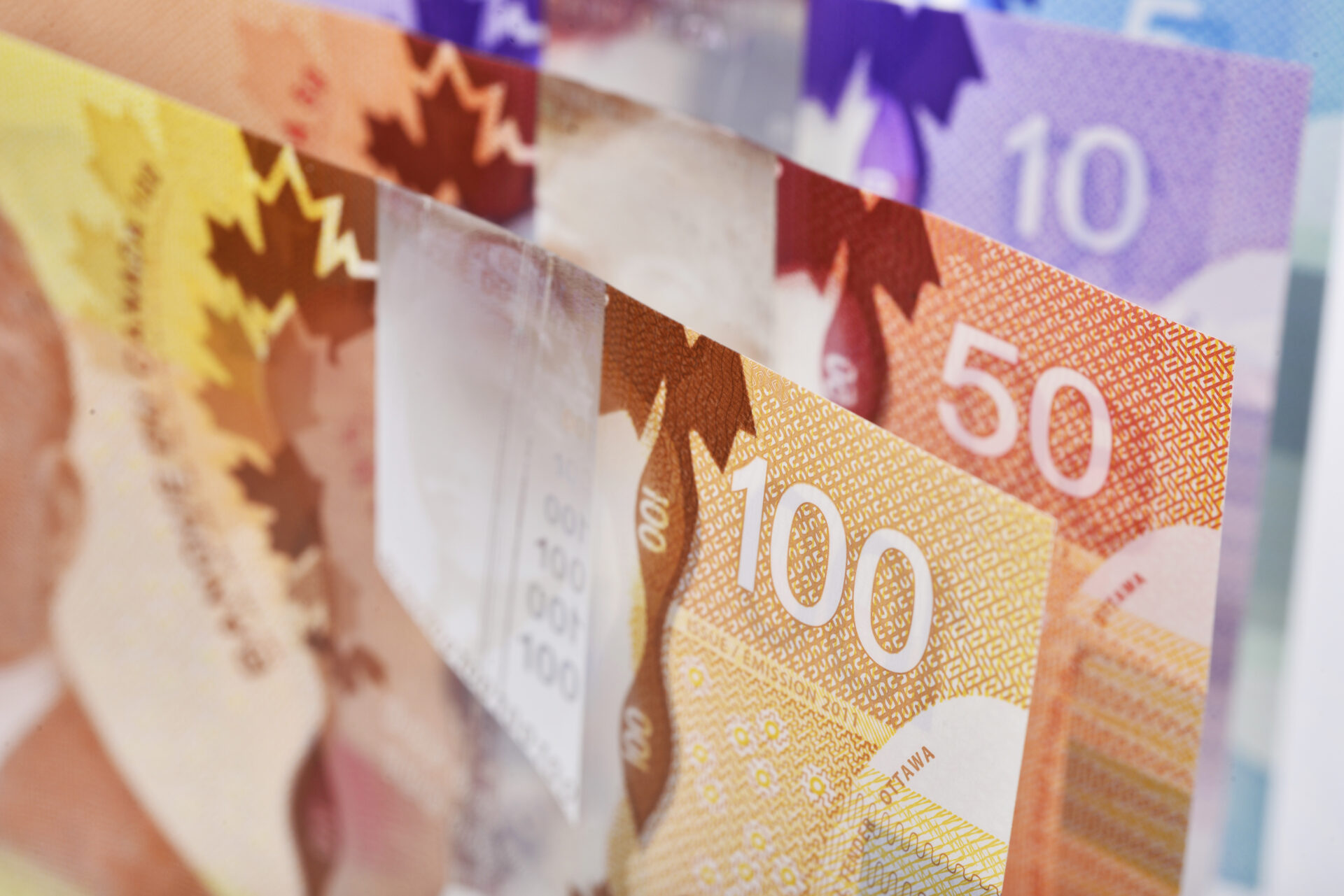 Canadian Job Growth Defies Forecasts as Wage Pressure Mounts